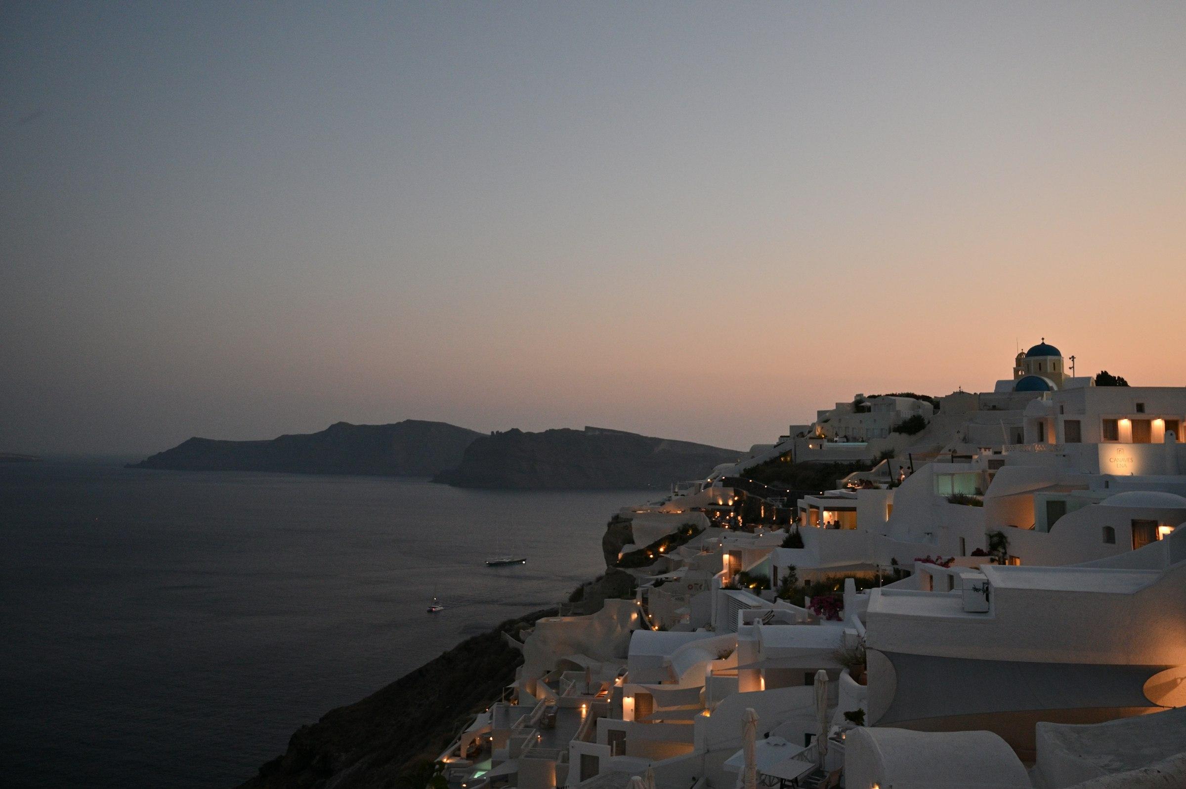 Santorini cliffside at dusk
